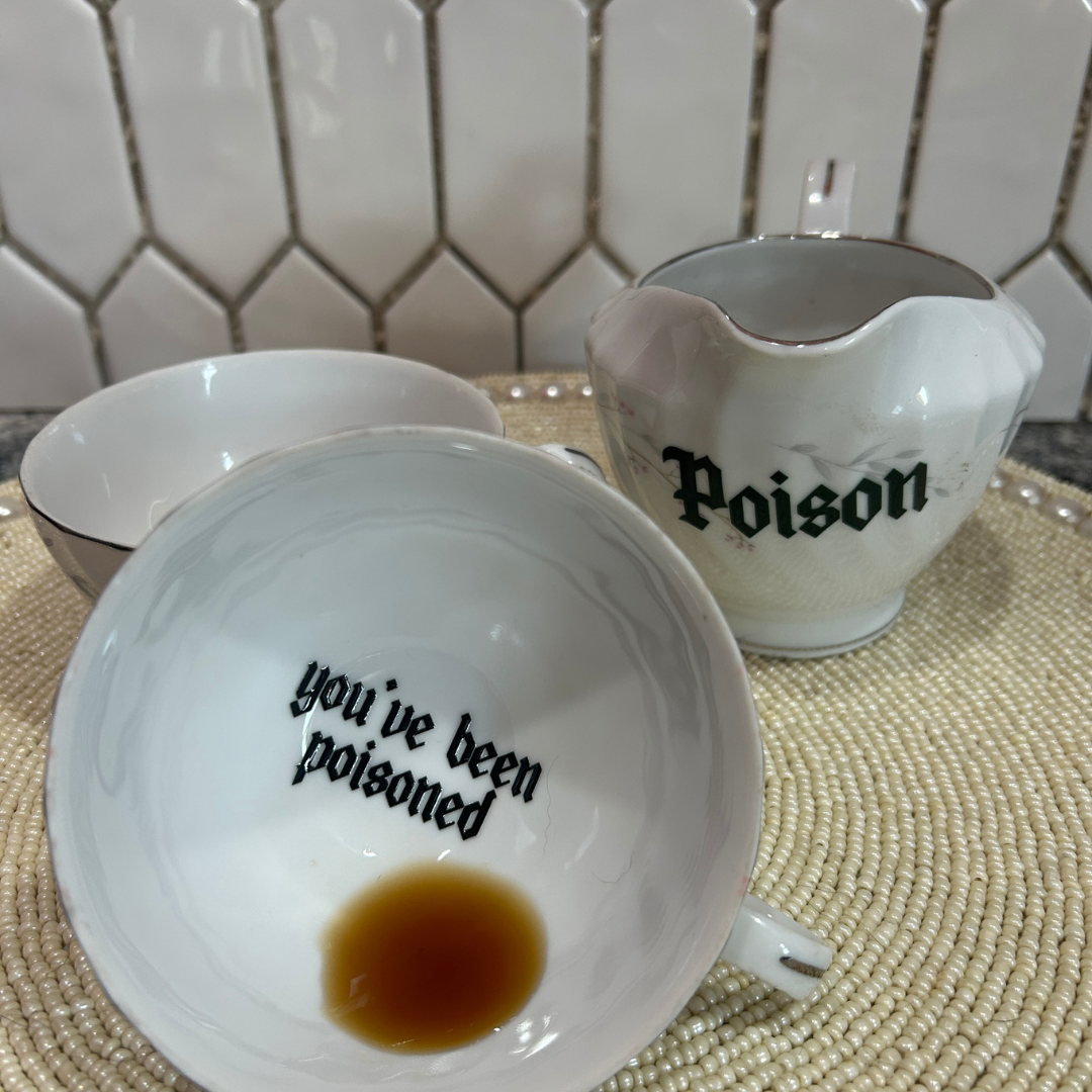 Two Teacups and Creamer - You've Been Poisoned
