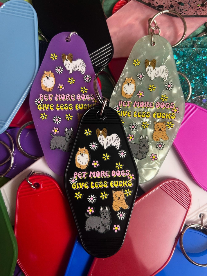 Pet More Dogs Give Less Fucks Motel Keychain