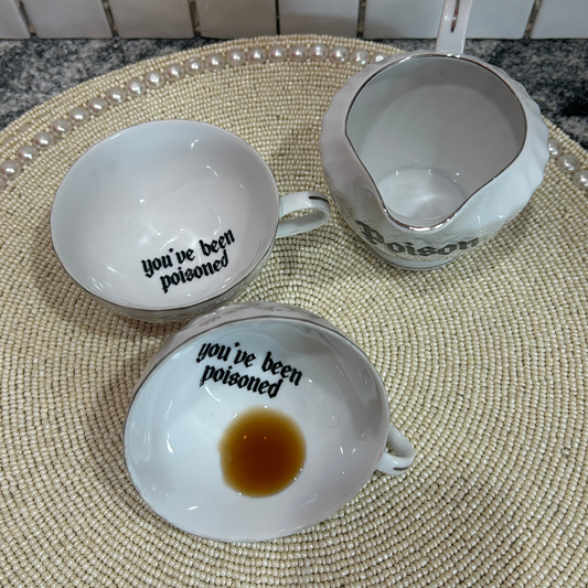 Two Teacups and Creamer - You've Been Poisoned